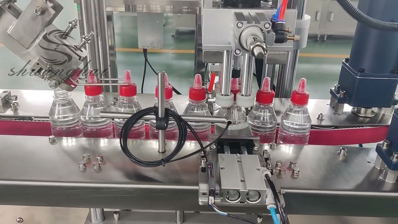 Automatic salad dressing filling machine.