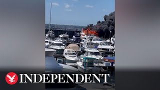 Superyacht worth £6m goes up in flames in Devon harbour