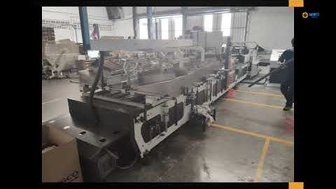 Corrugated cardboard partition assembler