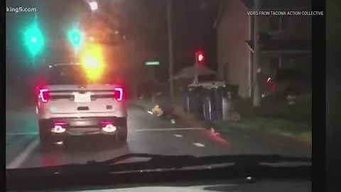 New video shows Tacoma police officer punching, re...