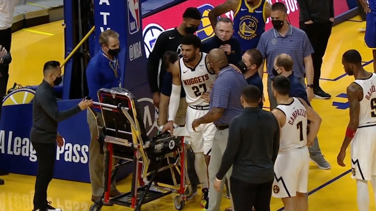 Jamal Murray helped off court after suffering apparent leg injury