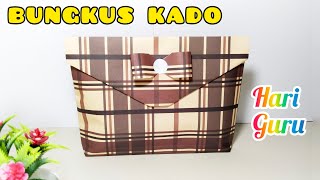 BUNGKUS KADO JILBAB UNTUK HARI GURU