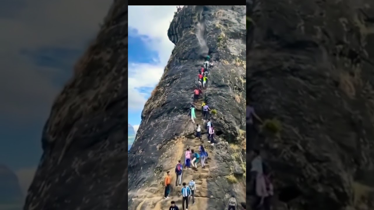 The road on the rocky hill suddenly collapsed