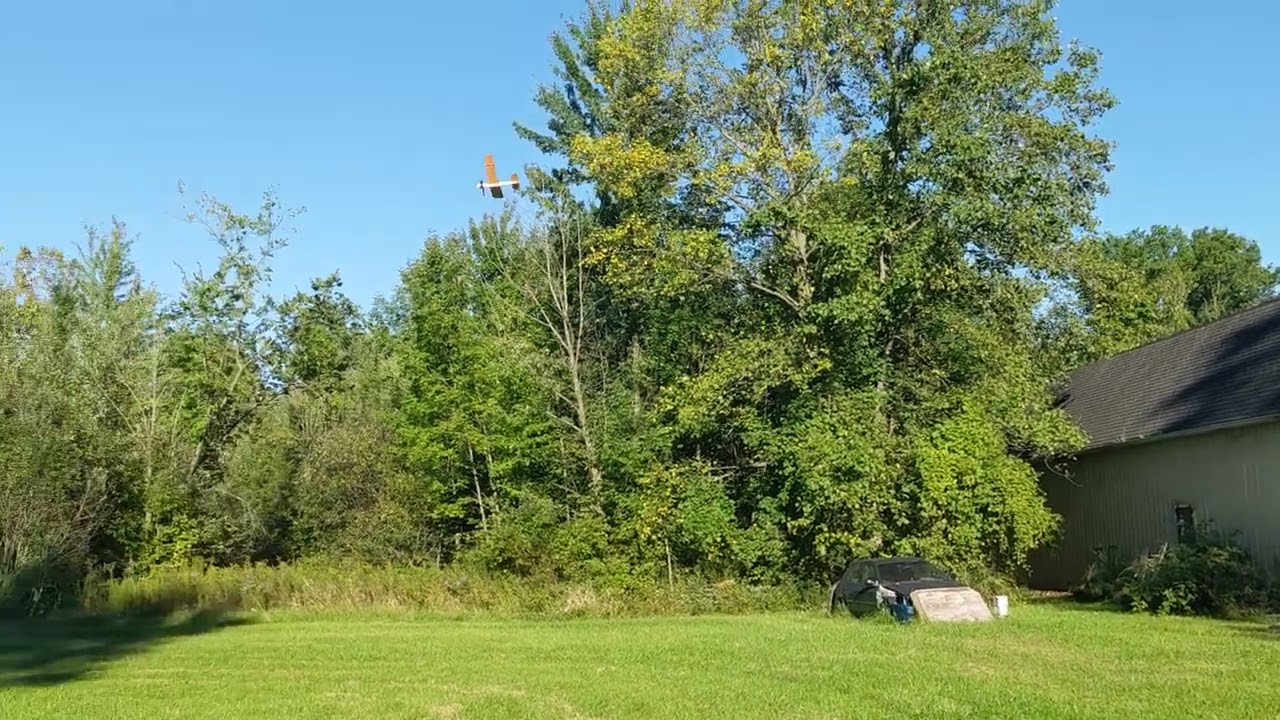 A customer building and flying the PaperFlight RC paper airplane kit