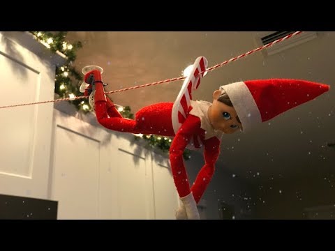 elf-on-the-shelf-caught-moving-and-talking,-riding-a-zip-line-part-two!