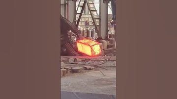 Forge this giant rectangular iron block at high temperature. Dangerous forging