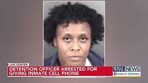 Detention officer caught giving phone to inmate