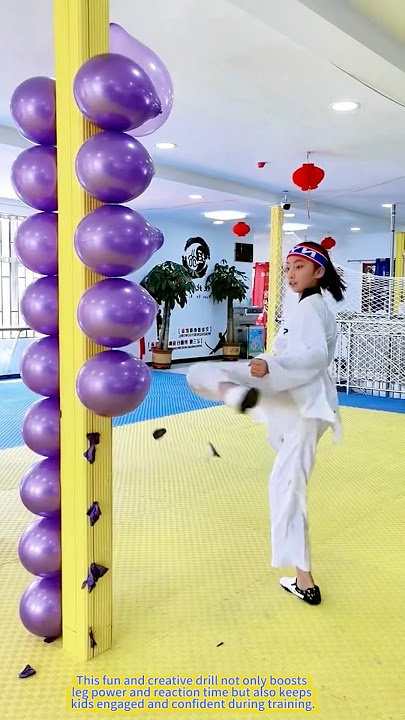 Precision and Power! Taekwondo Kid Kicks Balloons Like a Pro.