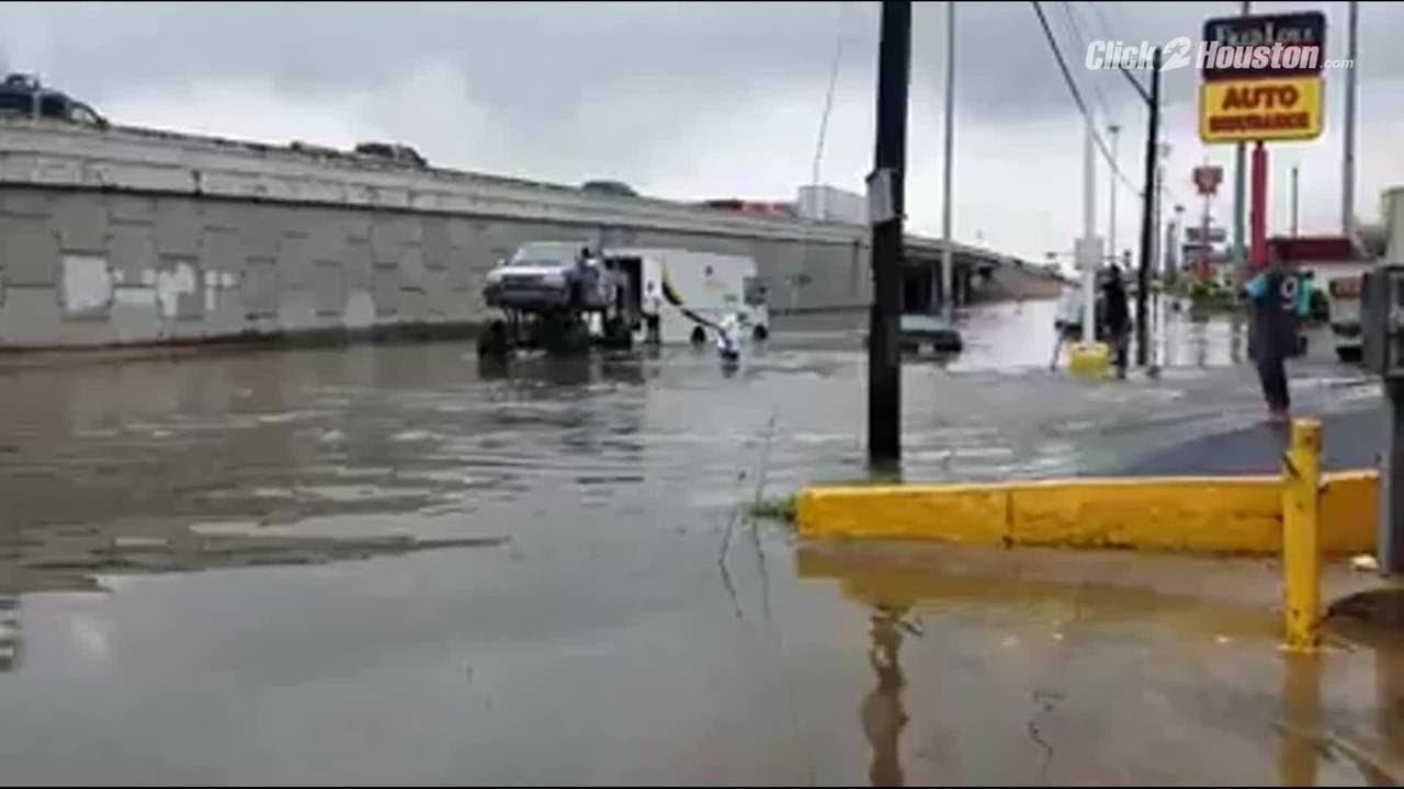 Monster truck driver rescues stranded vehicle