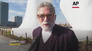 Sculpture 'shushes' toward NYC skyline