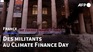 Paris: des militants investissent le Climate Finance Day | AFP