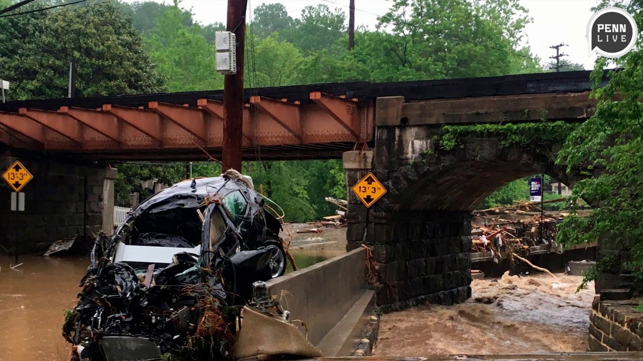 Ellicott City, Maryland: Watch as flood rushes down Main Street in town near Baltimore