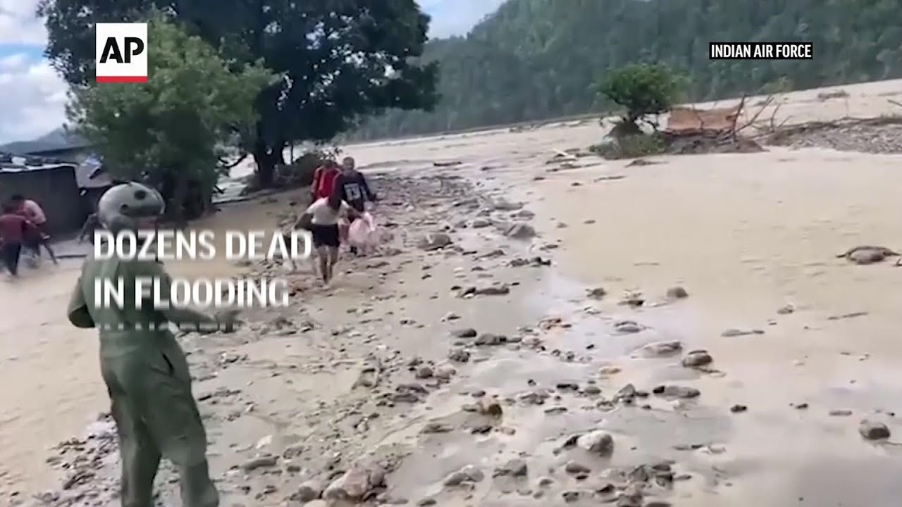 Dozens dead in flooding in northern India - YouTube