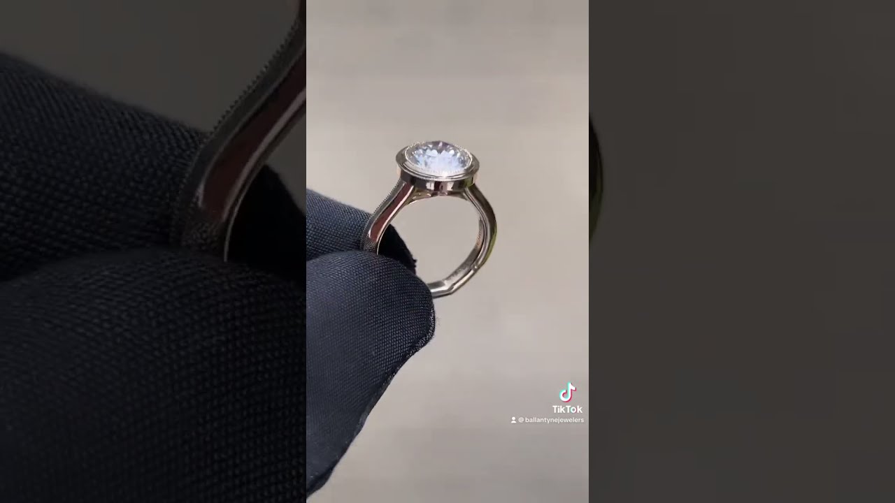 Round Brilliant Set In Our Custom Yellow Gold Bezel With Milgrain Edges 