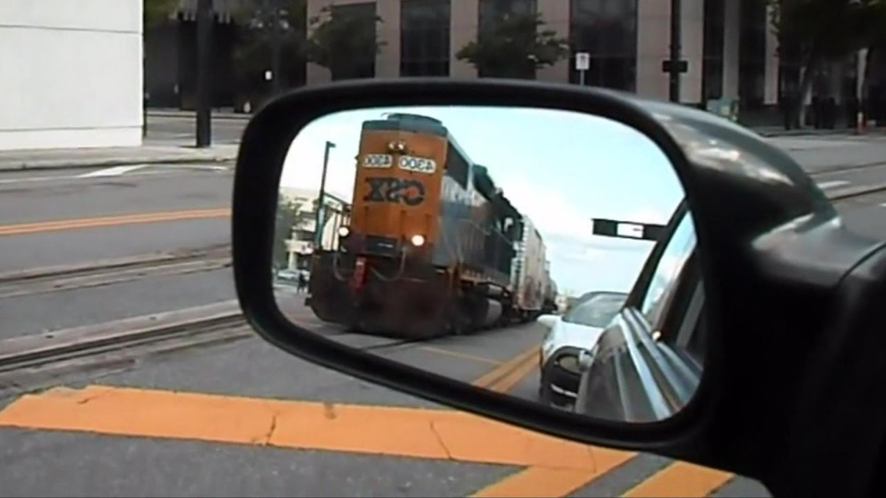 Trains And Cars Share The Road CSX Street Runner