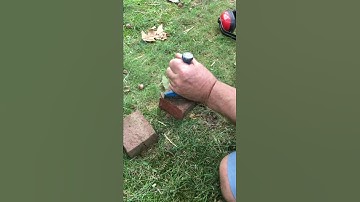Cutting bricks with a chisel