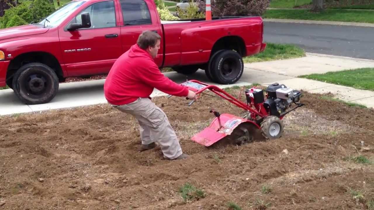 How do you use a garden tiller?