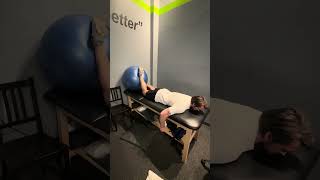 Prone knee extension isometric with yoga ball
