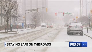 Staying safe on slippery roads as snow falls across Indianapolis