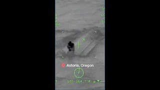 Coast Guard rescues father and son from overturned boat