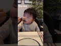 Baby attacks spoon during meals 😆