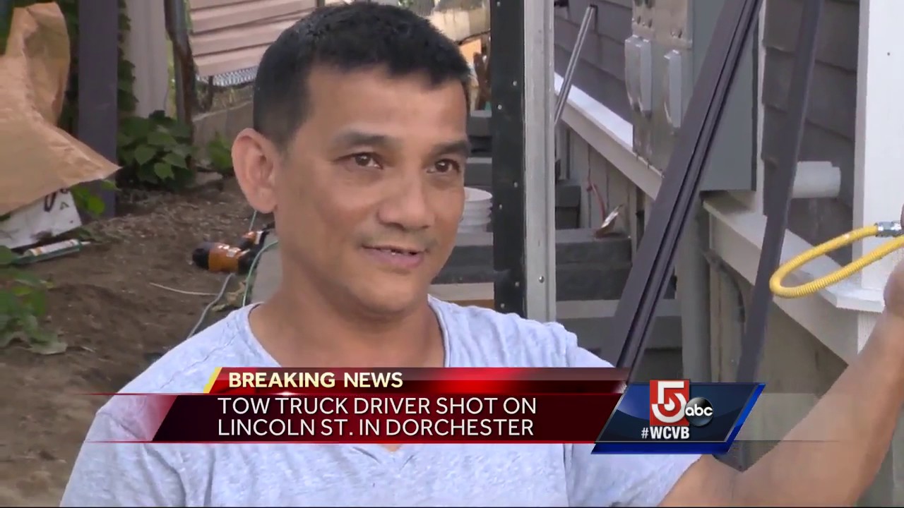 Tow truck driver shot at trying to remove vehicle - YouTube
