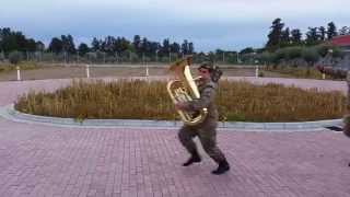 Following People with a tuba