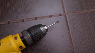 How to Drill a Hole Between Tiles.Using the Nail