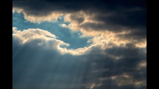 Sun rays and clouds
