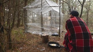 Building a Woodland shelter with Plastic Wrap | Survival Project | Easy Finnish Candle