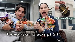 TRYING ASIAN SNACKS PT.2 (TRYING 1,000 YEAR OLD DUCK EGG?!)