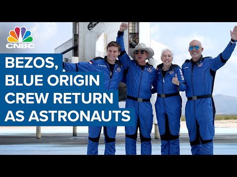 Jeff Bezos and Blue Origin crew return as astronauts after historic launch