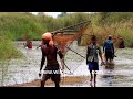Fishermen tries to catch fish in a rural Orissa village pond: Men return with their basket nets