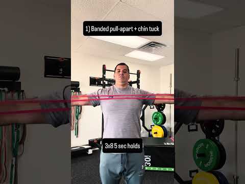 Dr. Andrew Cisneros, PT, DPT, MS demonstrating the banded pull-apart with chin tuck for desk neck stiffness at Solas PT in El Paso