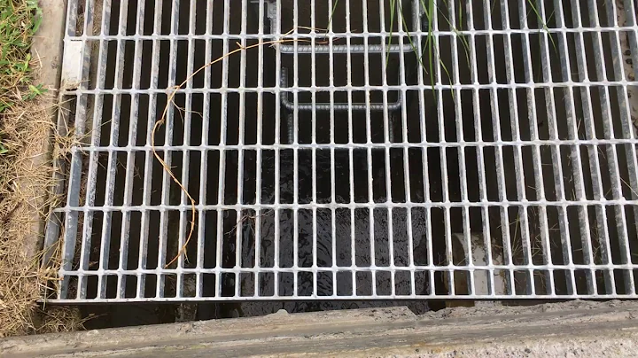 Stormwater detention pit and constructed swales