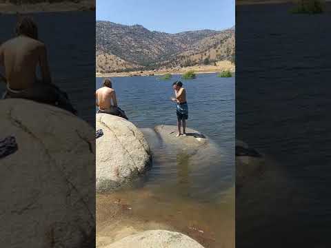 Vicente jumping off the rock at Slick Rock