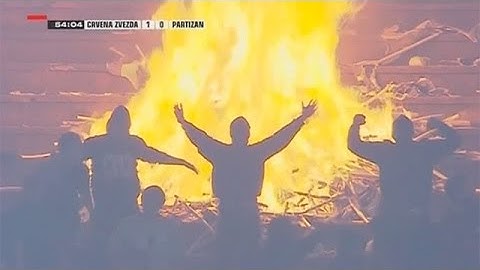 Crowd sets fire to stands at Belgrade derby match