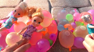 Water balloons! Elsa \& Anna toddlers - pool - water fun - floaties