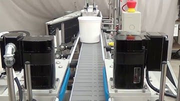 Wrap Labeling System for Tapered Containers