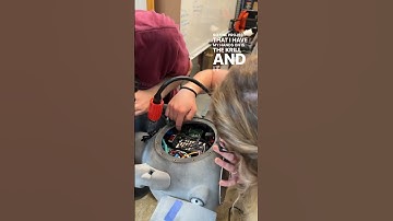 Ocean engineering Ph.D. student, Hannah Arnholt, mentors undergraduates studying undersea robotics.