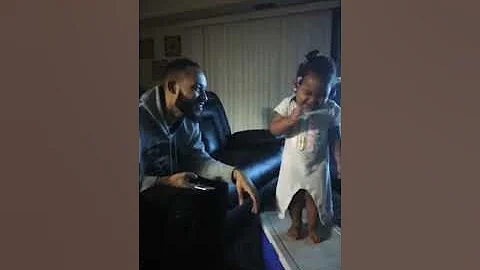 Daddy and 1 year old daughter singing duet