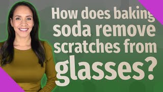 How does baking soda remove scratches from glasses?