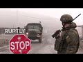 Nagorno-Karabakh: Russian peacekeepers inspect cars at checkpoint near Shusha