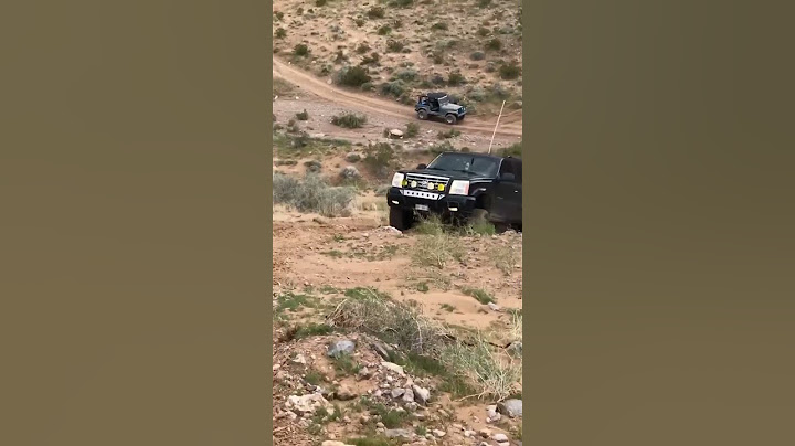 Lifted cadillac Escalade off road
