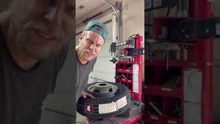 How mechanics fill Big Floppy Tires with air Cheetah tire mounting difficult bead seating 1 man fill