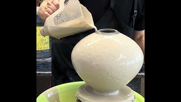 799. glazing a textured moon jar