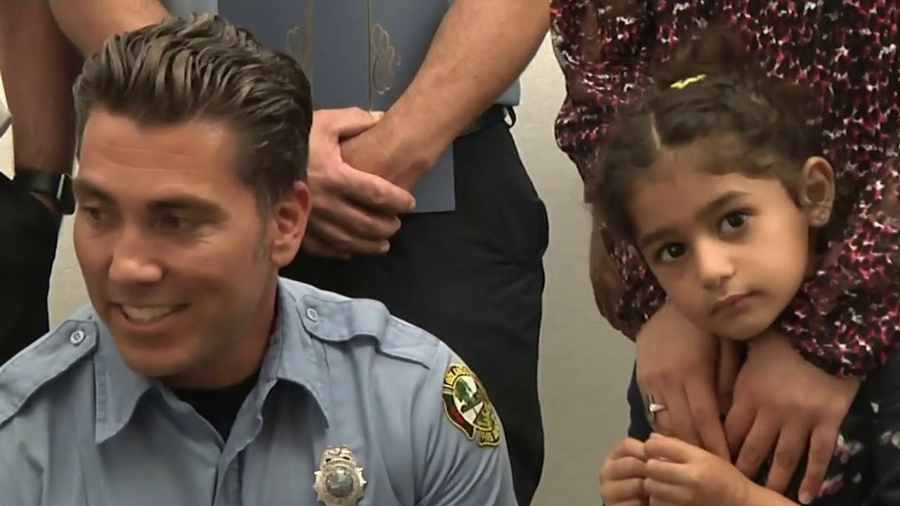 Firefighter reunited with girl he saved - YouTube