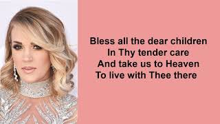 Video thumbnail of "Away in a Manger by Carrie Underwood (Lyric Video)"