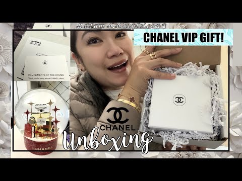 I am thinking of purchasing this Chanel pouch but it says with compliments  by Chanel. Is it a free VIP gift? Does anyone know anything about this or  the VIP gifts? 