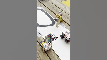 Construye con Nezha y programa con MakeCode un circuito para trabajar la educación vial conduciendo.